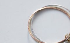 THREE WHISPERS DIAMOND RING