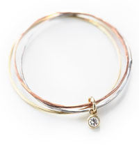 THREE WHISPERS DIAMOND RING