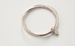 THREE WHISPERS DIAMOND RING