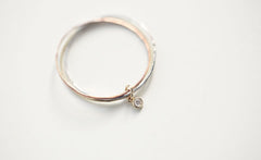 THREE WHISPERS DIAMOND RING