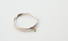 THREE WHISPERS DIAMOND RING