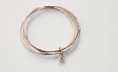 THREE WHISPERS DIAMOND RING