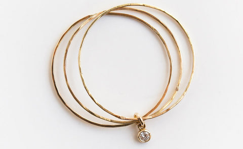 YELLOW GOLD THREE WHISPERS DIAMOND RING